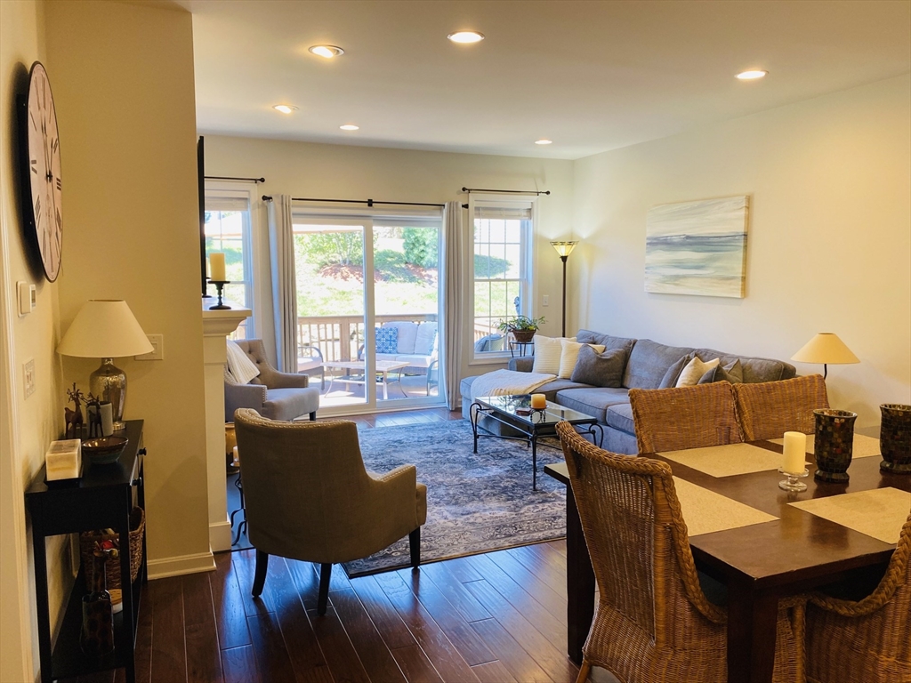 41 Shannon Way, Unit 41 Upton, MA 01568 - Photo 14 of 36 a living room with furniture and a large window
