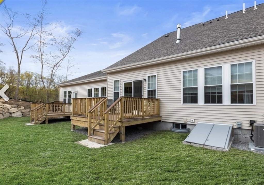 41 Shannon Way, Unit 41 Upton, MA 01568 - Photo 29 of 36 a front view of a house with a yard