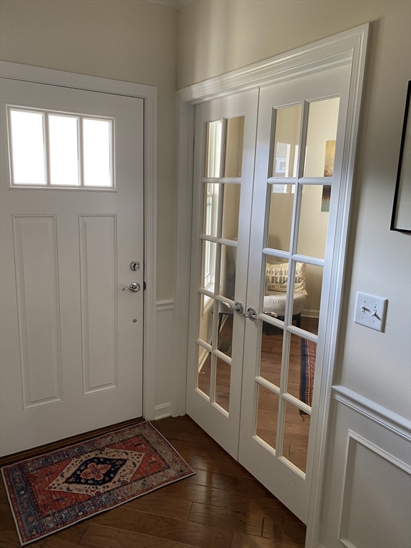 41 Shannon Way, Unit 41 Upton, MA 01568 - Photo 5 of 36 a view of an empty room with wooden floor and a window