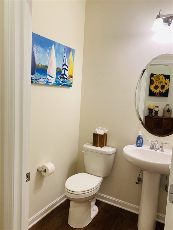 41 Shannon Way, Unit 41 Upton, MA 01568 - Photo 8 of 36 a white toilet sitting next to a bathroom sink