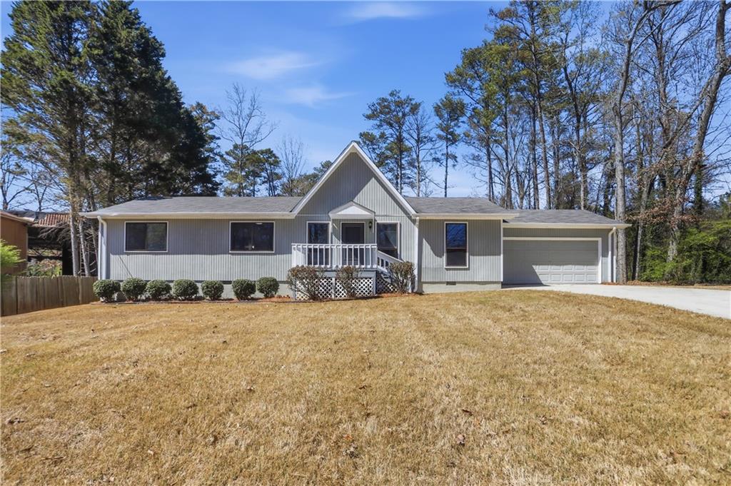 front view of a house with a yard