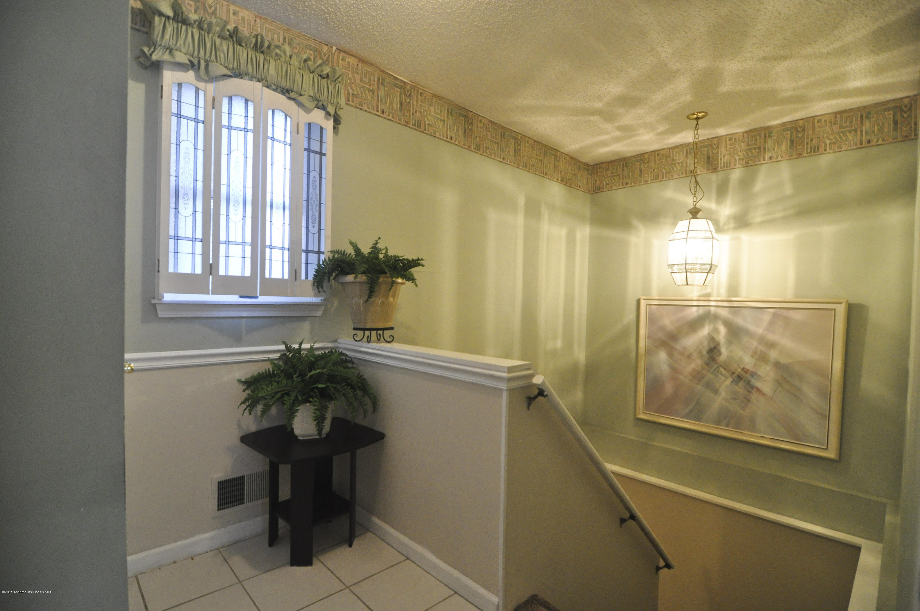 128 Manaqua Road Freehold, NJ 07728 - Photo 23 of 36 foyer to basement