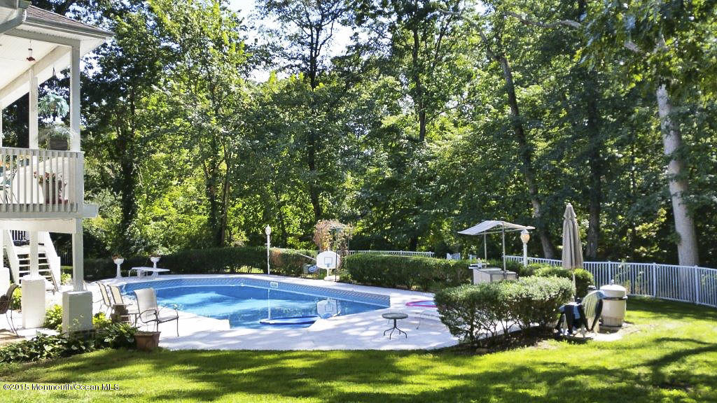 128 Manaqua Road Freehold, NJ 07728 - Photo 4 of 36 backyard pool