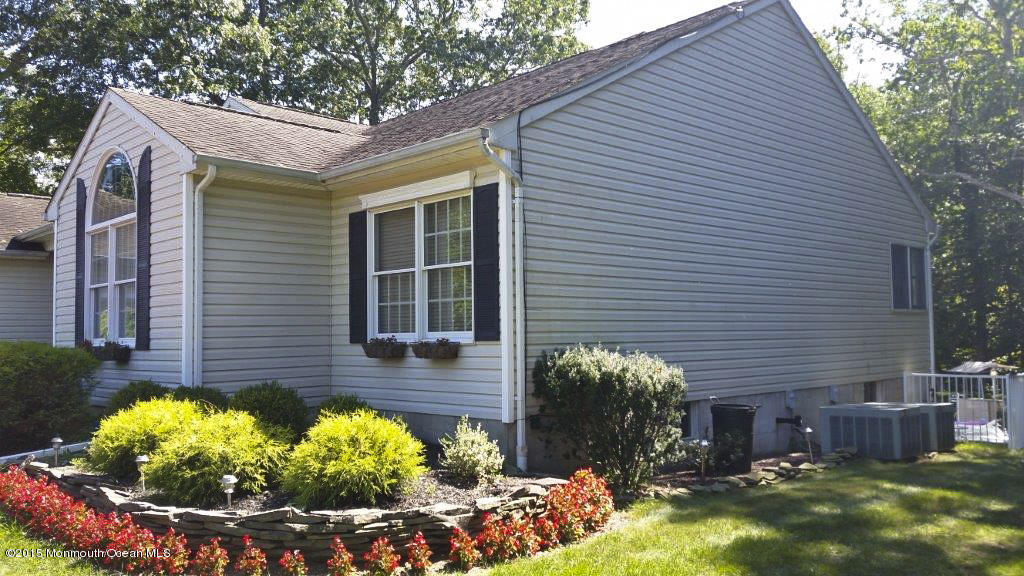 128 Manaqua Road Freehold, NJ 07728 - Photo 34 of 36 house side