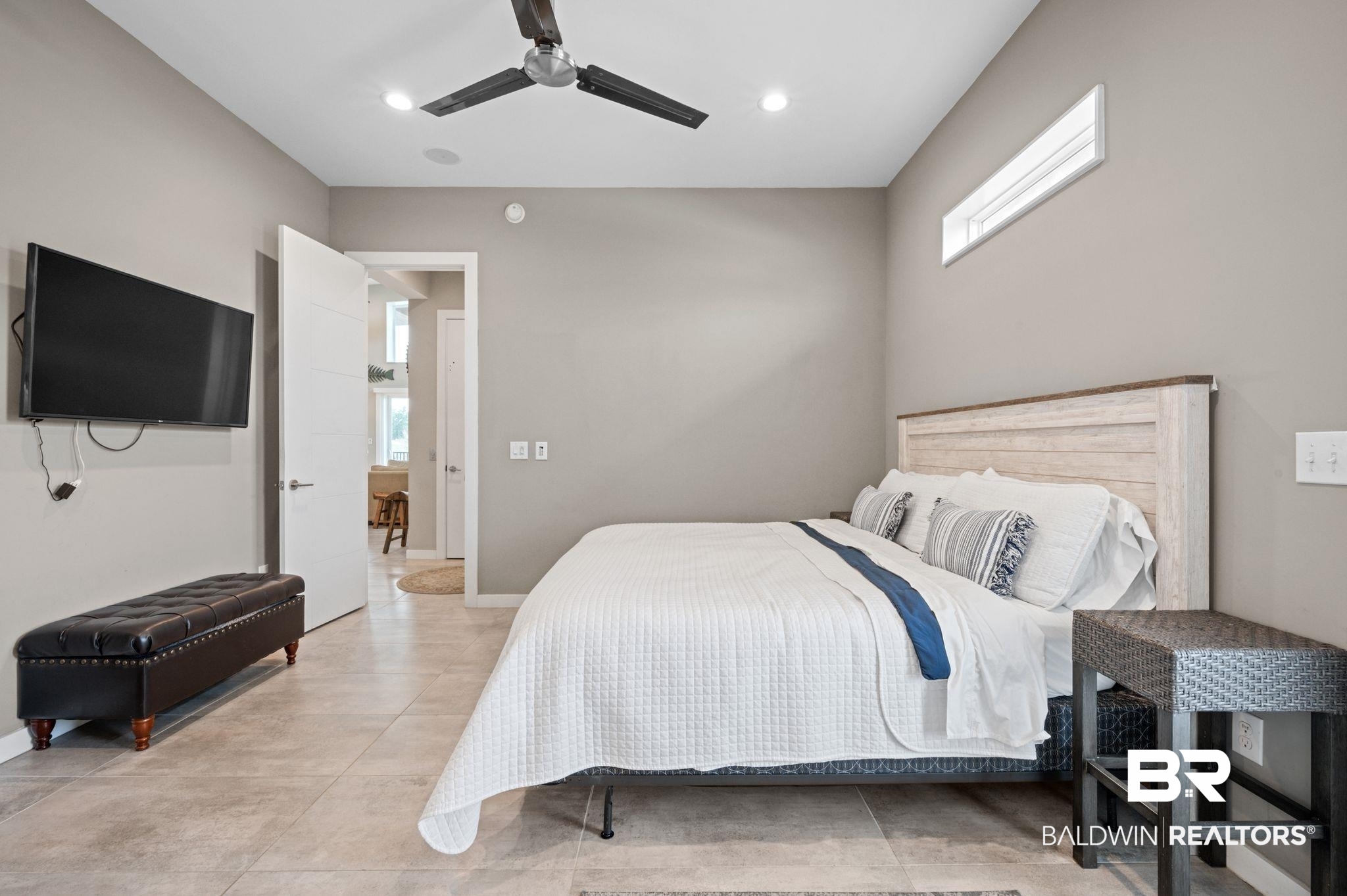 3840 Cotton Way Orange Beach, AL 36561 - Photo 23 of 75 Tiled bedroom featuring multiple windows and ceiling fan