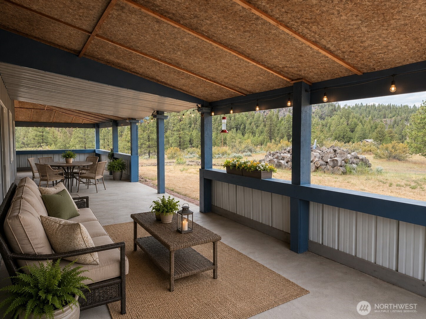 41238 Sterling Valley Road North Lincoln, WA 99147 - Photo 27 of 39 a living room with furniture and a big yard