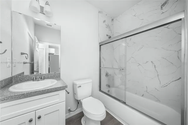 a bathroom with a bath tub and a shower