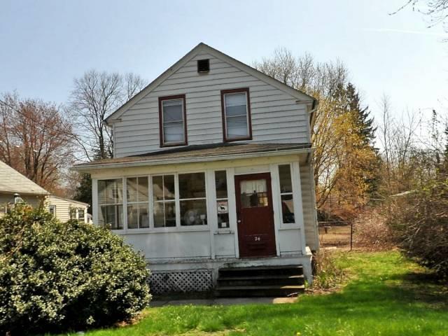 24 Brainard Road Enfield, CT 06082 - Photo 1 of 1 a view of house with yard and green space