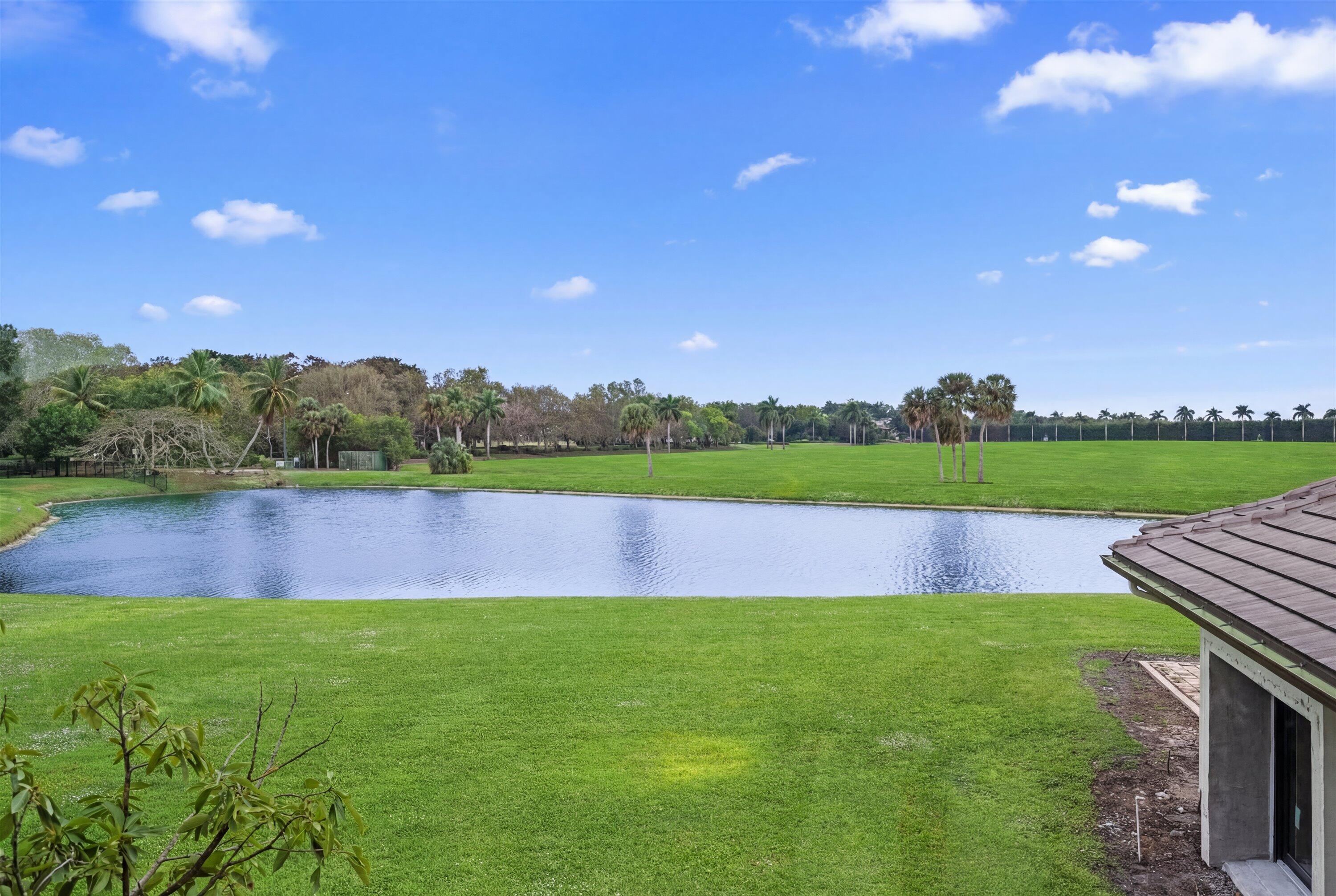 13254 Polo Club Road, Unit C202 Wellington, FL 33414 - Photo 25 of 27 a view of a lake