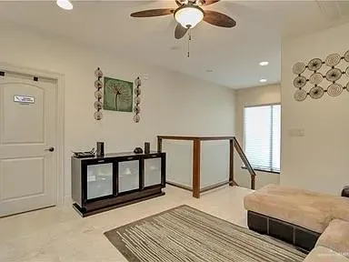 a bedroom with furniture and a window