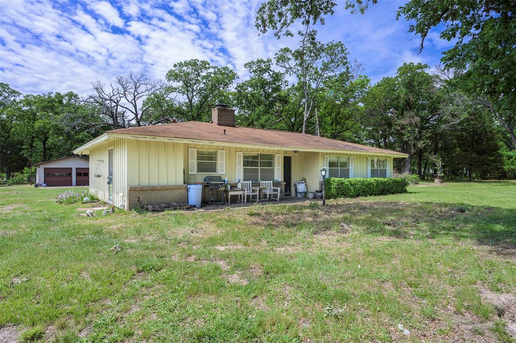 1113 West Will White Road Kemp, TX 75143 - Photo 1 of 22 a view of a house with a yard