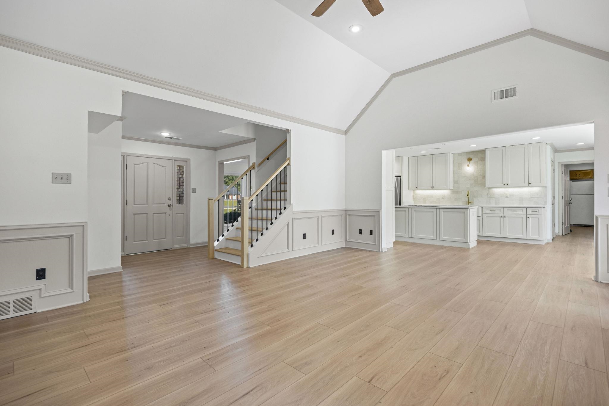 10661 Chapel Hill Road Lakeland, TN 38002 - Photo 11 of 40 an empty room with wooden floor and windows