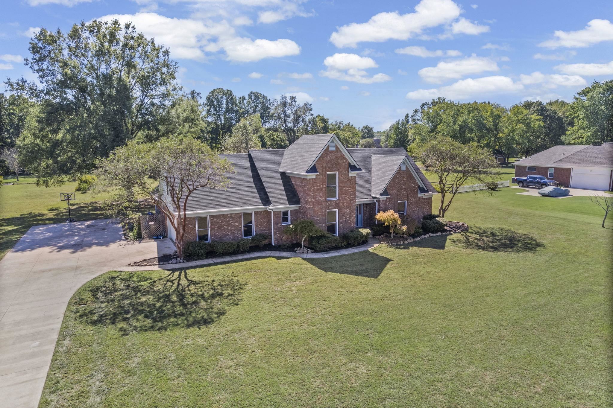 10661 Chapel Hill Road Lakeland, TN 38002 - Photo 3 of 40 an aerial view of a house