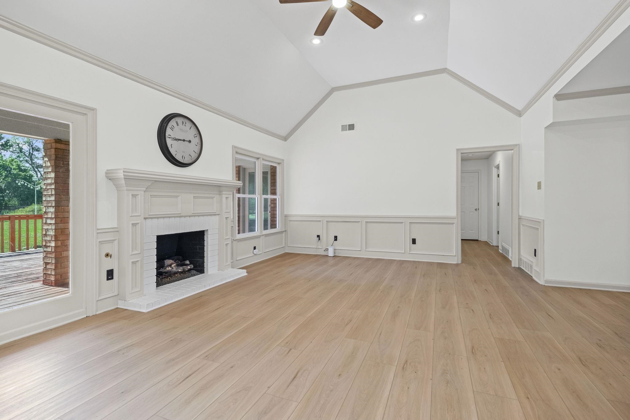 10661 Chapel Hill Road Lakeland, TN 38002 - Photo 9 of 40 a view of a livingroom with an empty space and a fireplace