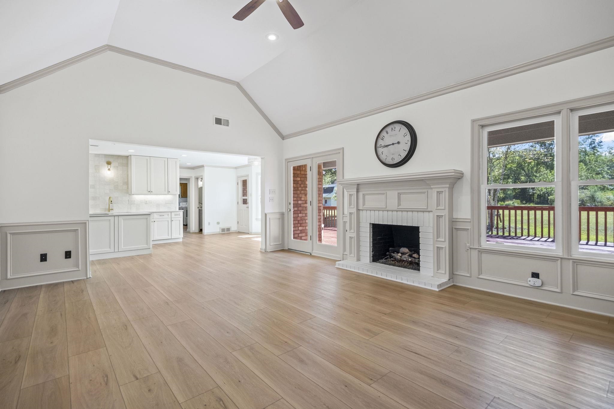 10661 Chapel Hill Road Lakeland, TN 38002 - Photo 10 of 40 a view of empty room with wooden floor and fireplace