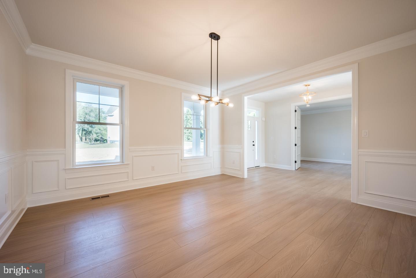 548 Old Forge Road, Unit 1 Media, PA 19063 - Photo 11 of 37 a view of a room with wooden floor chandelier and window