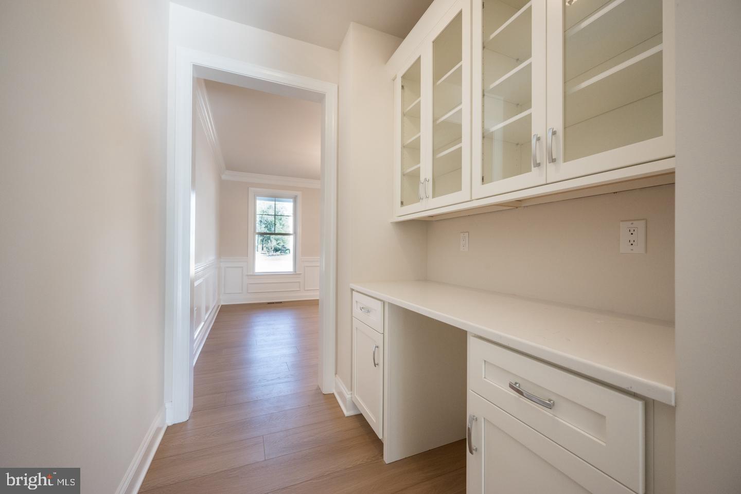 548 Old Forge Road, Unit 1 Media, PA 19063 - Photo 7 of 37 a view of an entryway with wooden floor and cabinet