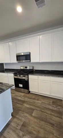 a view of bathroom with a sink and a toilet