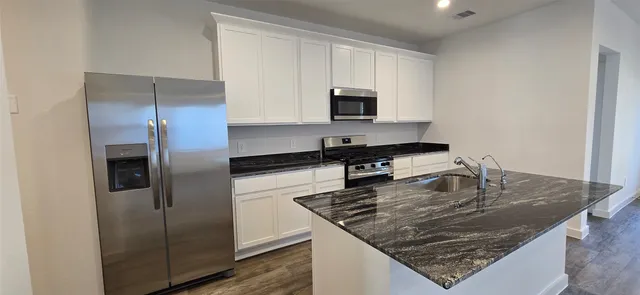 a bathroom with a sink and a tub