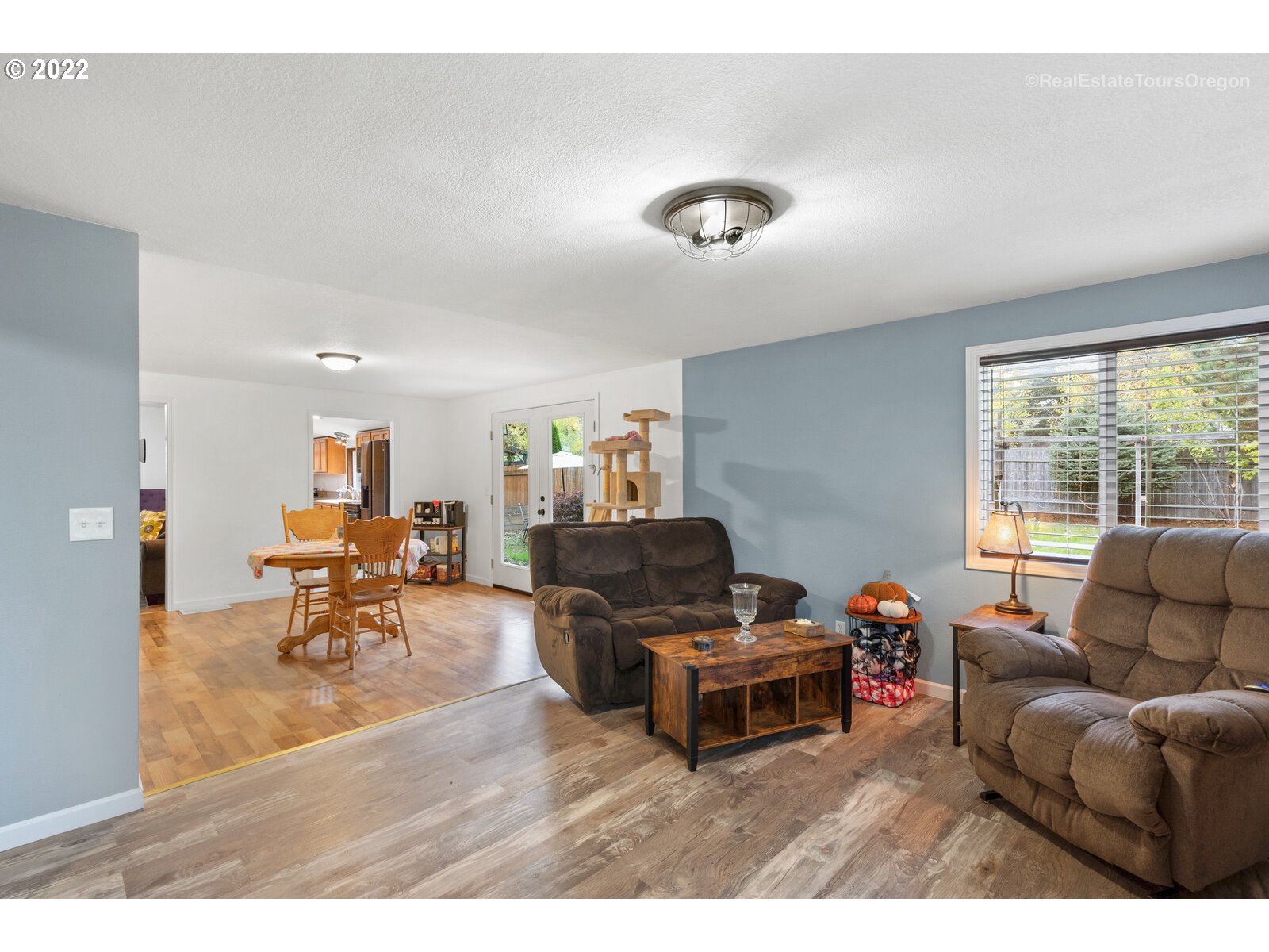 707 Roxe Drive Forest Grove, OR 97116 - Photo 11 of 32 a living room with furniture and a large window