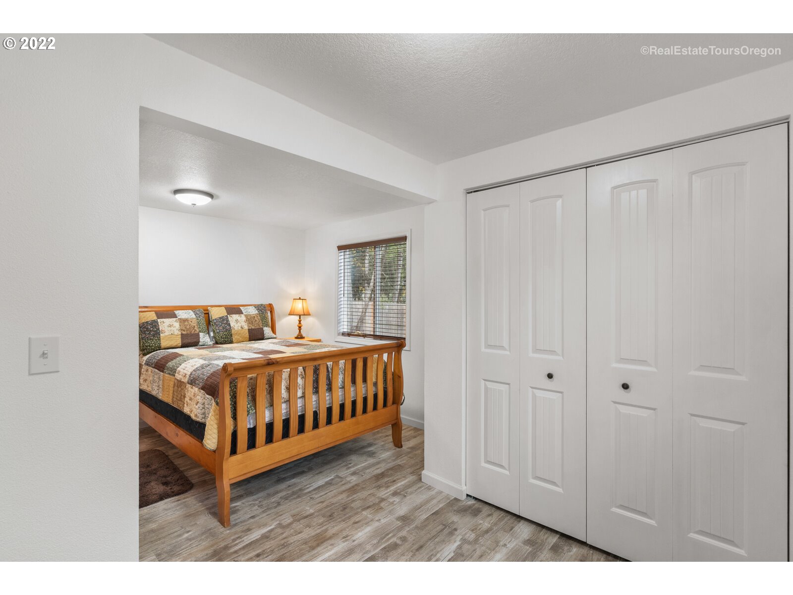 707 Roxe Drive Forest Grove, OR 97116 - Photo 16 of 32 a bedroom with a bed and a window