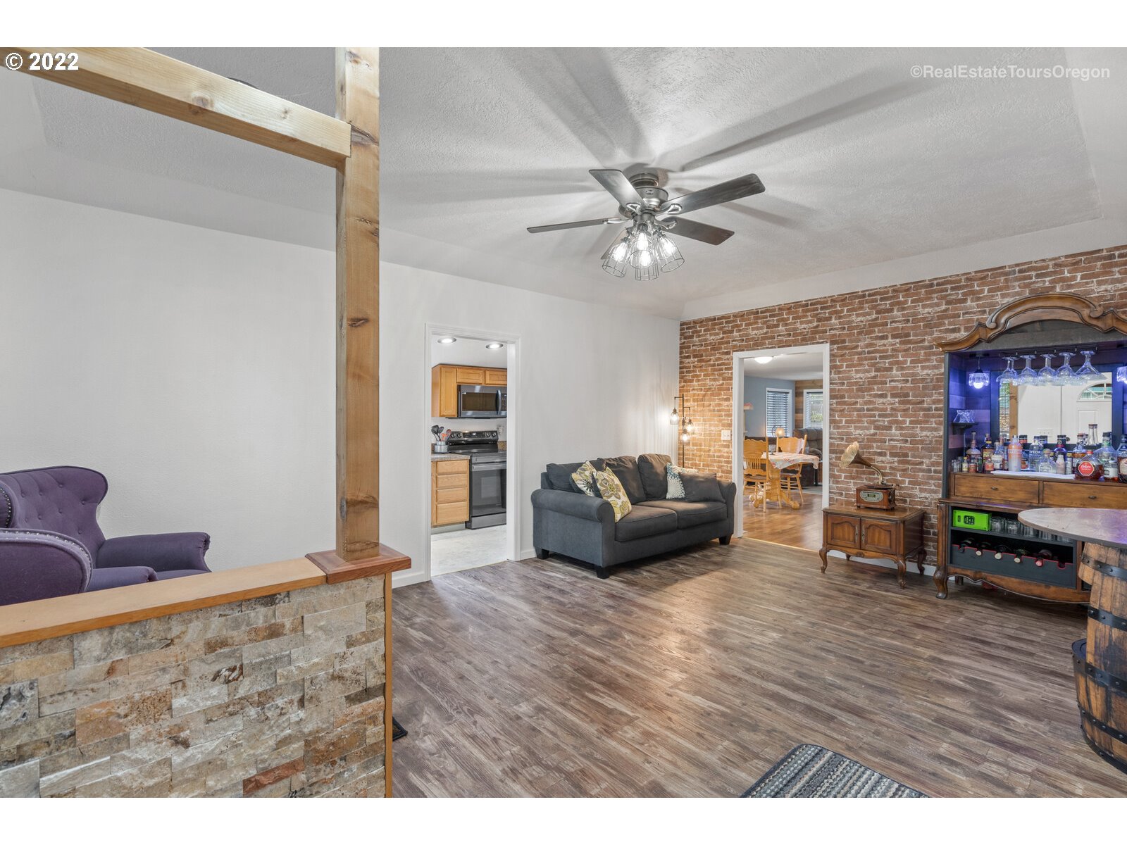 707 Roxe Drive Forest Grove, OR 97116 - Photo 2 of 32 a living room with furniture and wooden floor