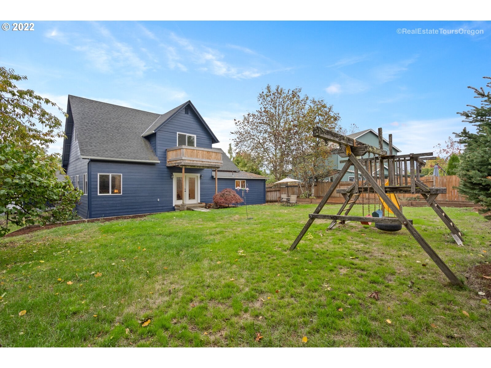 707 Roxe Drive Forest Grove, OR 97116 - Photo 30 of 32 a house with green field in front of it