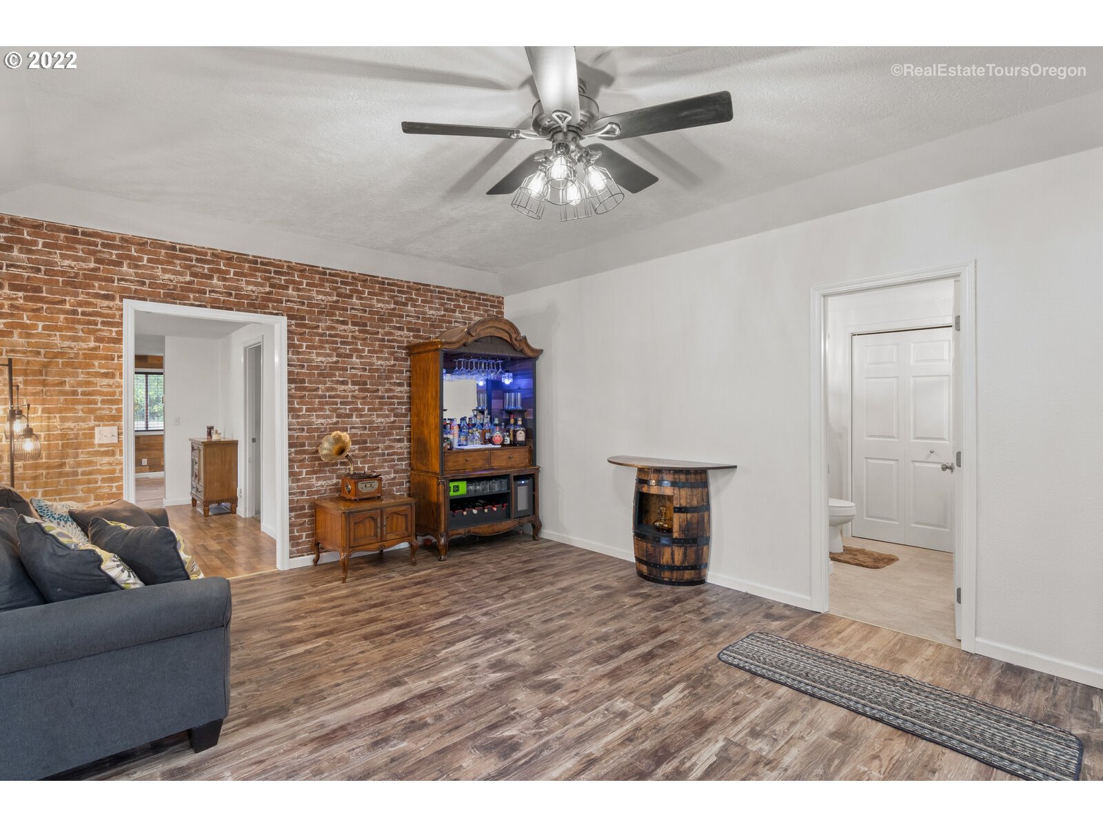 707 Roxe Drive Forest Grove, OR 97116 - Photo 3 of 32 a living room with furniture and a flat screen tv