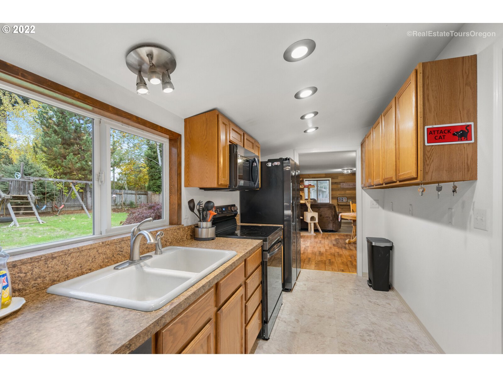 707 Roxe Drive Forest Grove, OR 97116 - Photo 8 of 32 a kitchen with a sink appliances and a counter top space