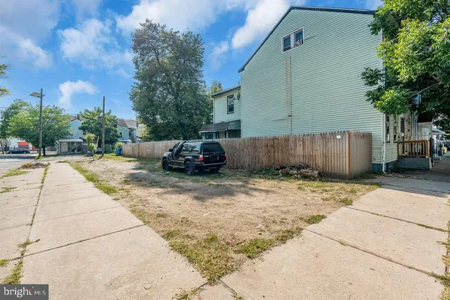 a car parked in front of a house