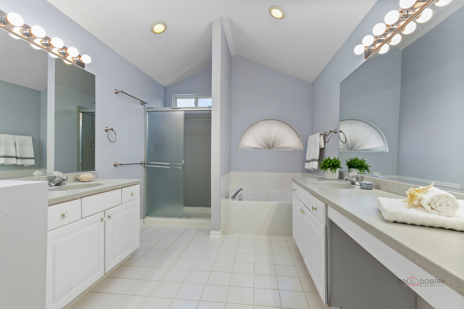 597 Treetop Lane Gurnee, IL 60031 - Photo 17 of 34 a spacious bathroom with a granite countertop double vanity sink and a mirror