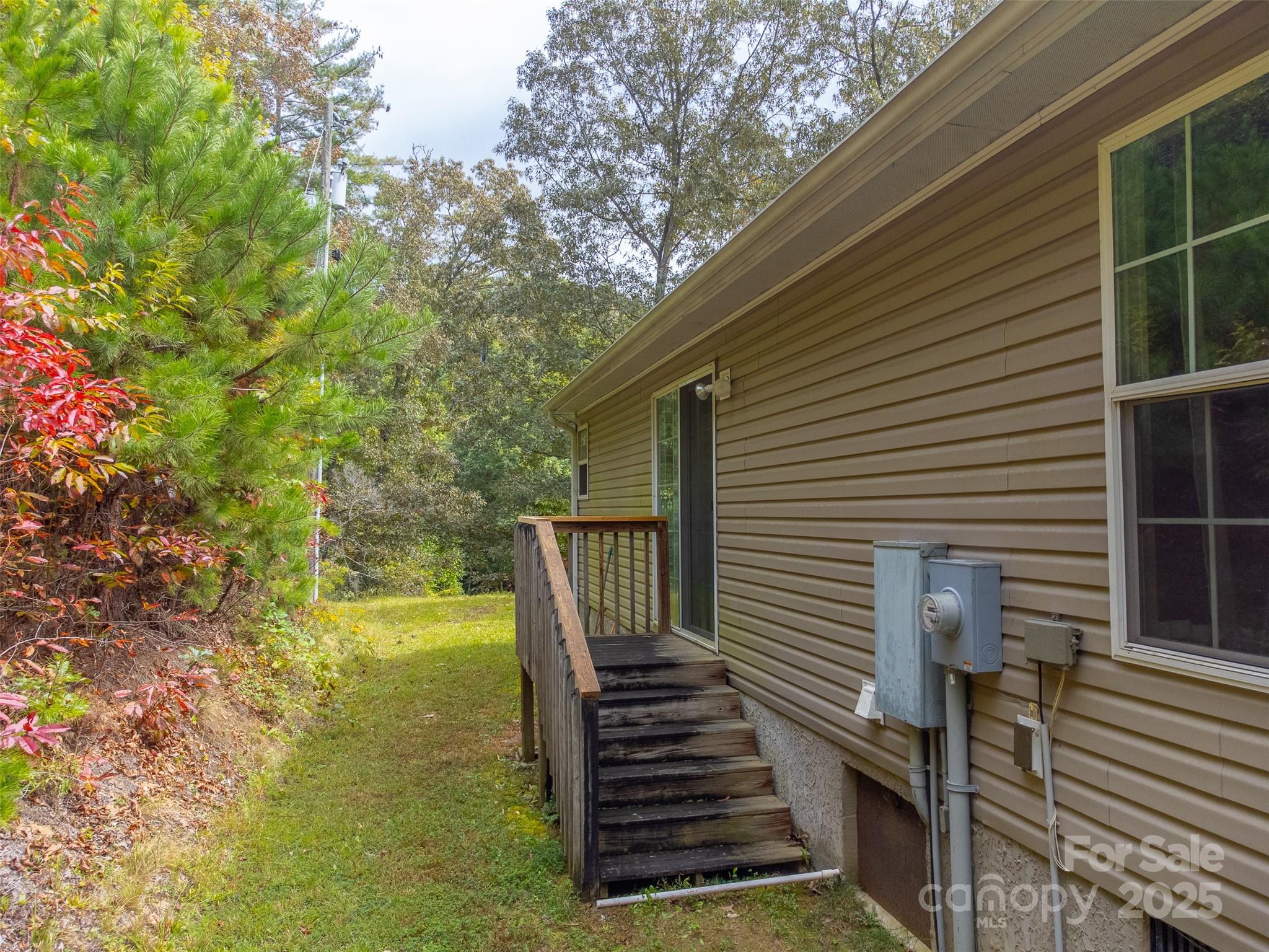 179 Fresh Water Rdg Road Whittier, NC 28789 - Photo 38 of 48 a view of a backyard with side of the house