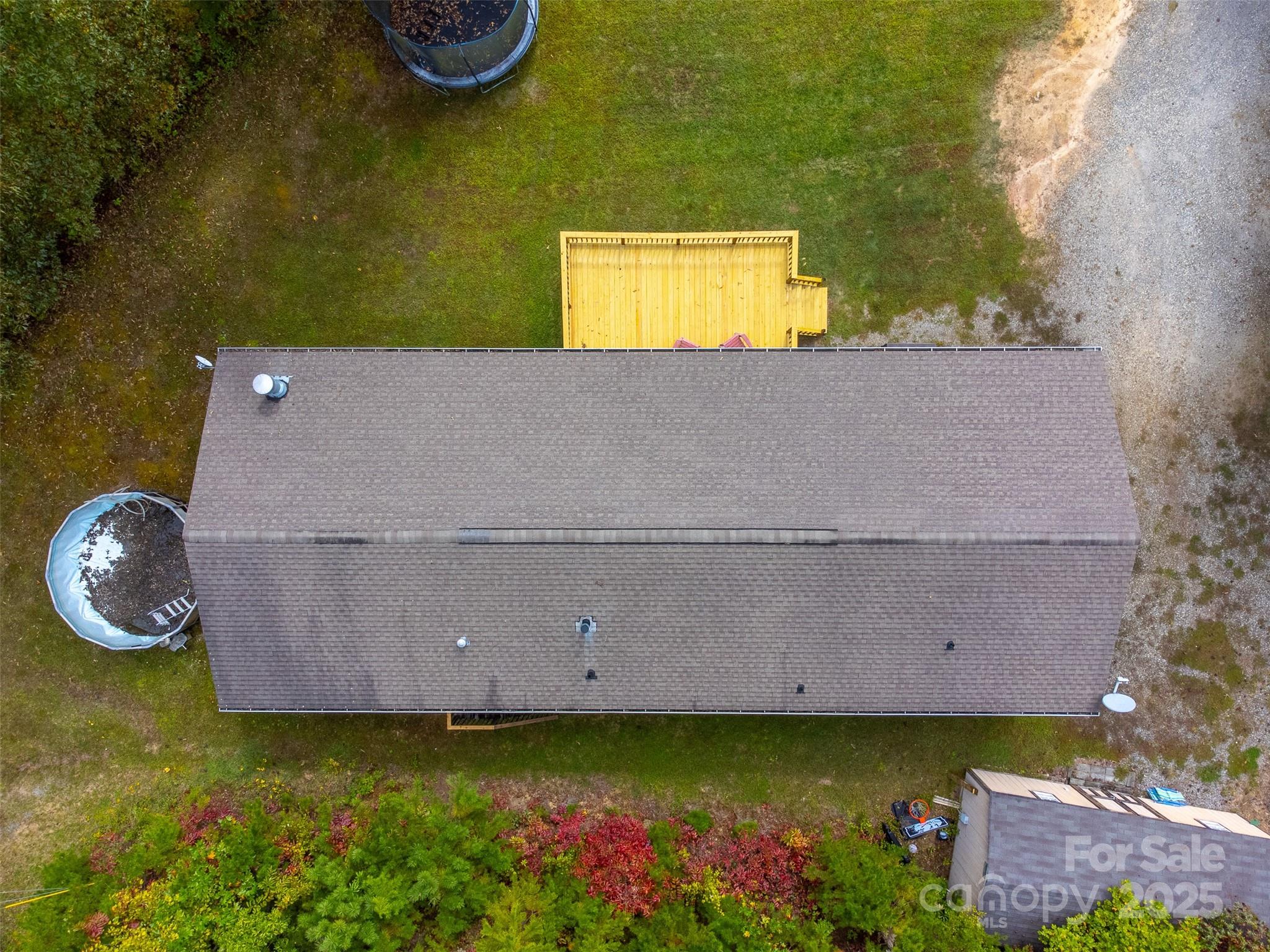 179 Fresh Water Rdg Road Whittier, NC 28789 - Photo 45 of 48 an aerial view of a house with swimming pool and big yard