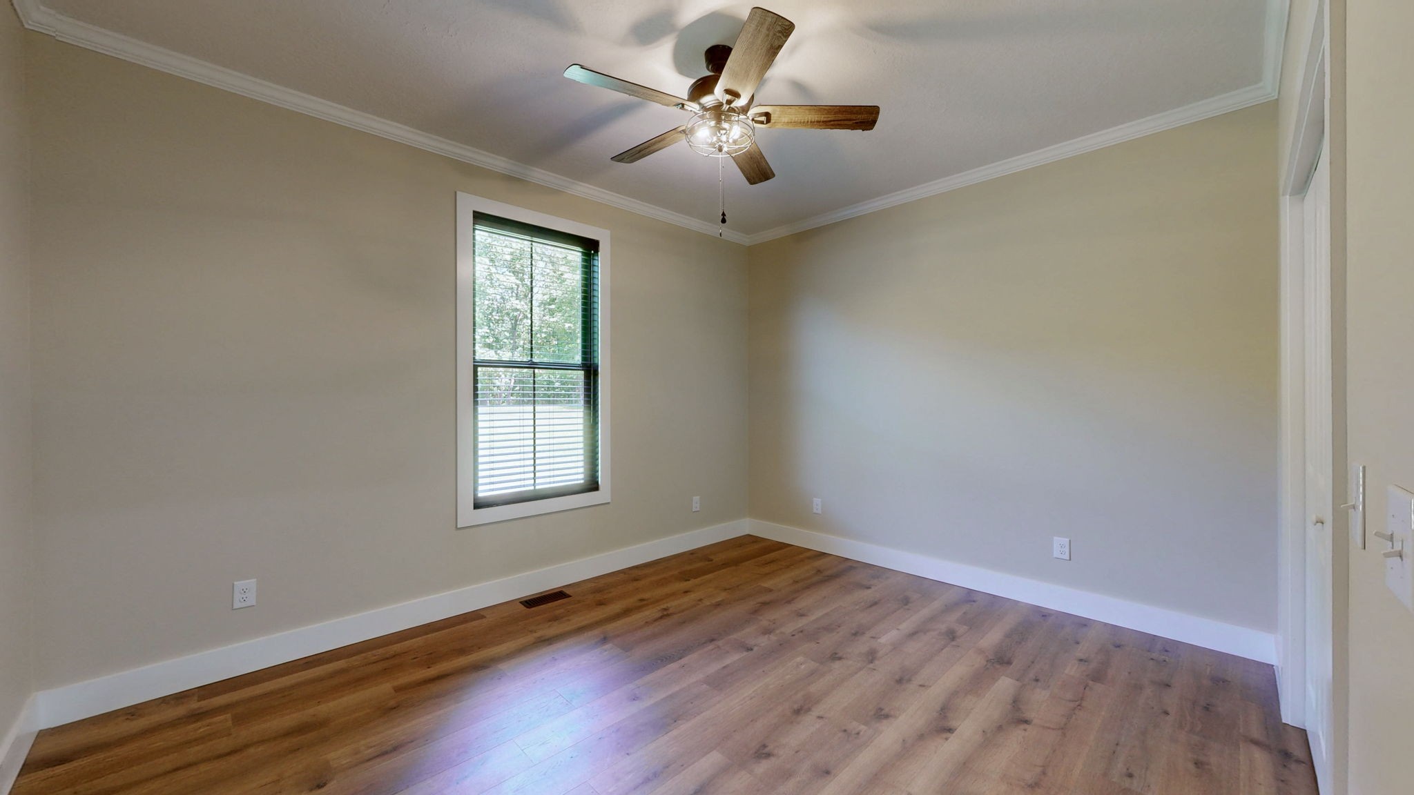 865 Alman Cemetery Road Paris, TN 38242 - Photo 24 of 41 wooden floor in an empty room with a window