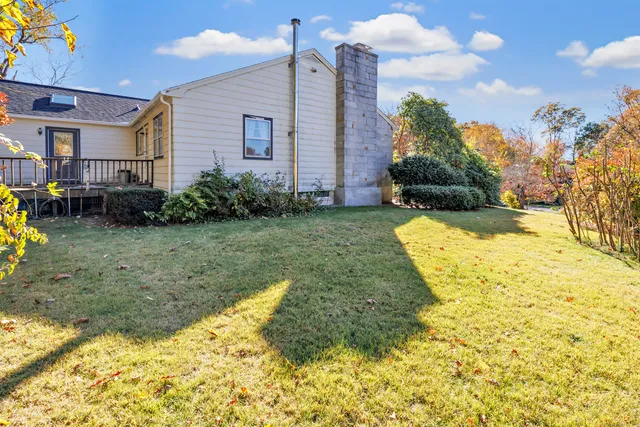 a view of a swimming pool and an outdoor space