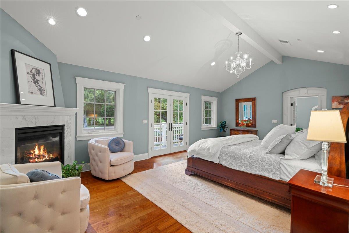 3510 Alpine Road Portola Valley, CA 94028 - Photo 25 of 77 a spacious bedroom with a bed couch and window
