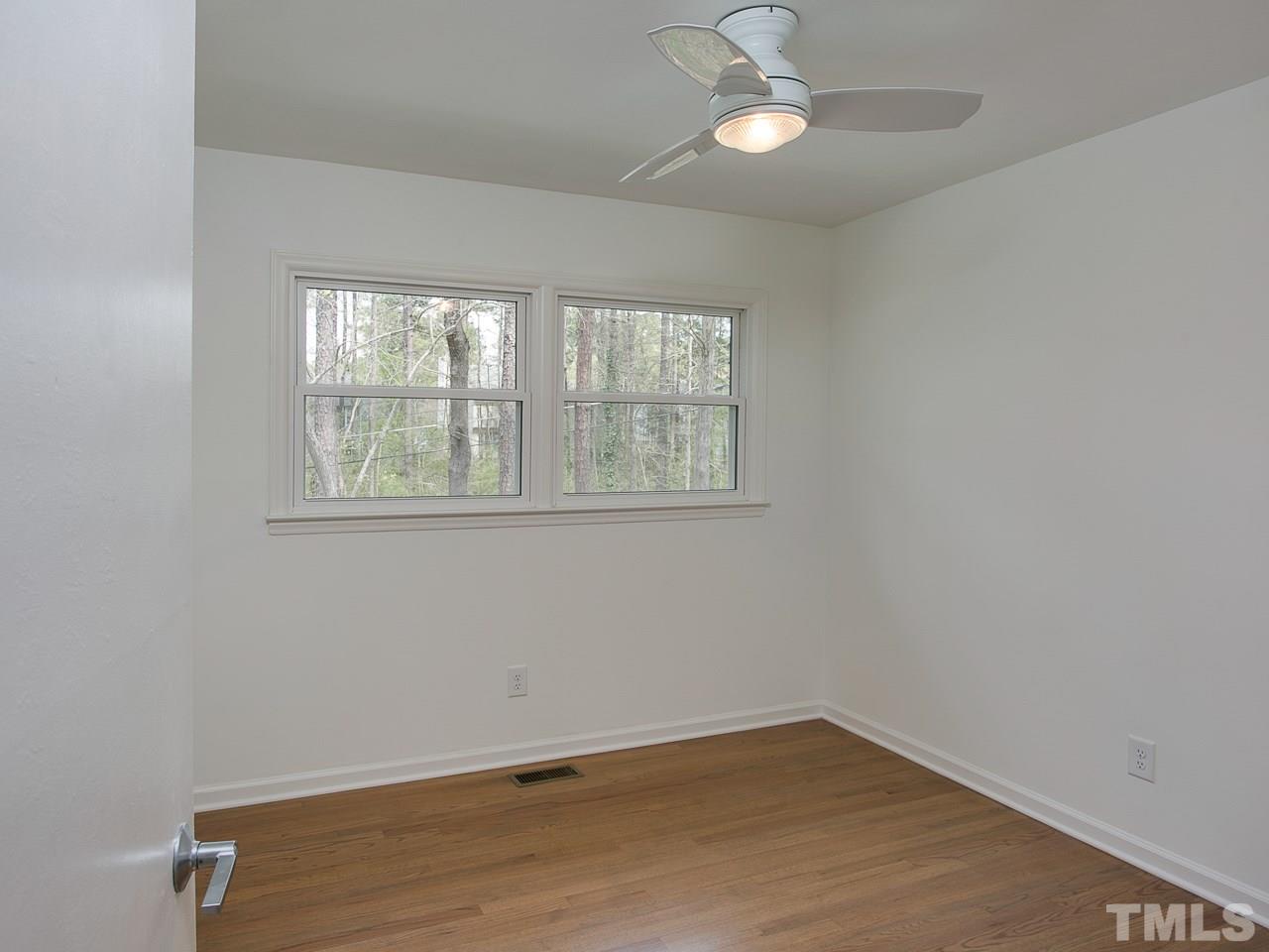 1909 Fountain Ridge Road Chapel Hill, NC 27517 - Photo 16 of 25 an empty room with a window