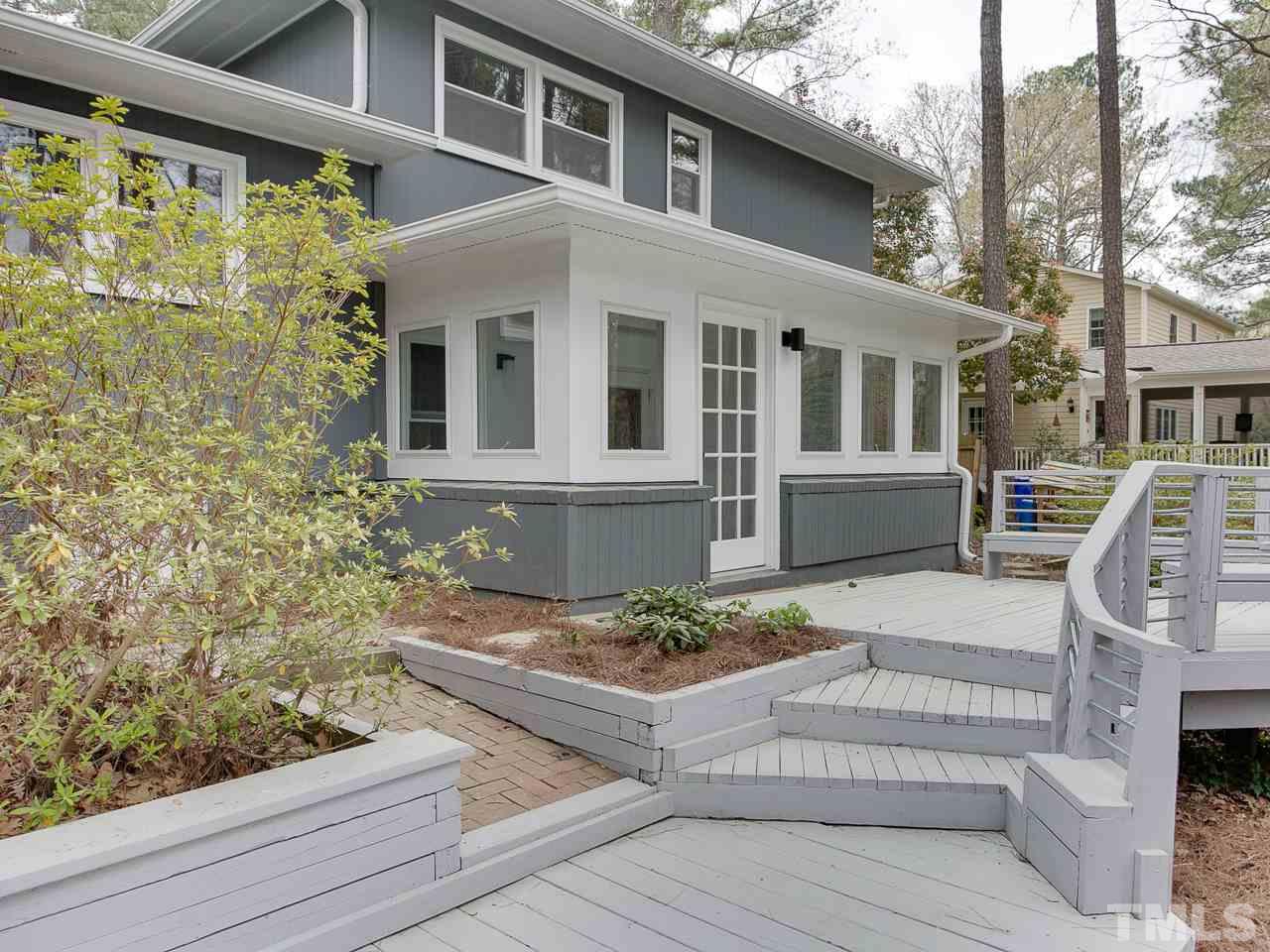 1909 Fountain Ridge Road Chapel Hill, NC 27517 - Photo 19 of 25 a front view of a house with garden