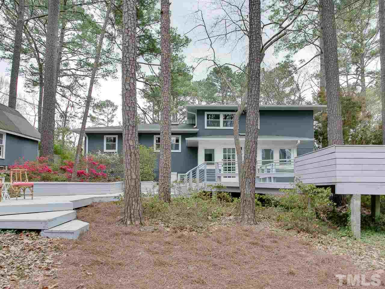 1909 Fountain Ridge Road Chapel Hill, NC 27517 - Photo 20 of 25 a front view of a house with garden