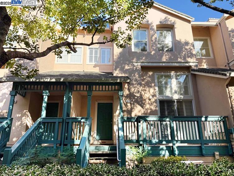 1046 Dolphin Com Fremont, CA 94536 - Photo 1 of 1 a view of a house with a small yard and wooden fence