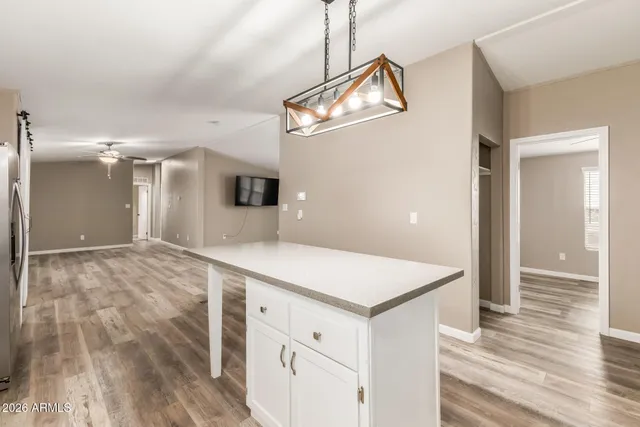 a bathroom with a toilet and a shower curtain