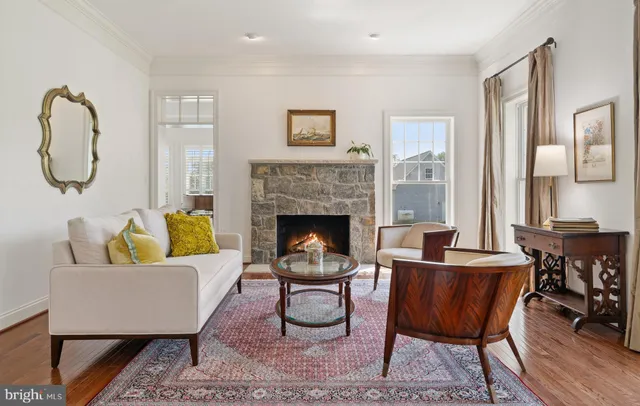 a kitchen with kitchen island granite countertop a sink counter top space appliances and cabinets