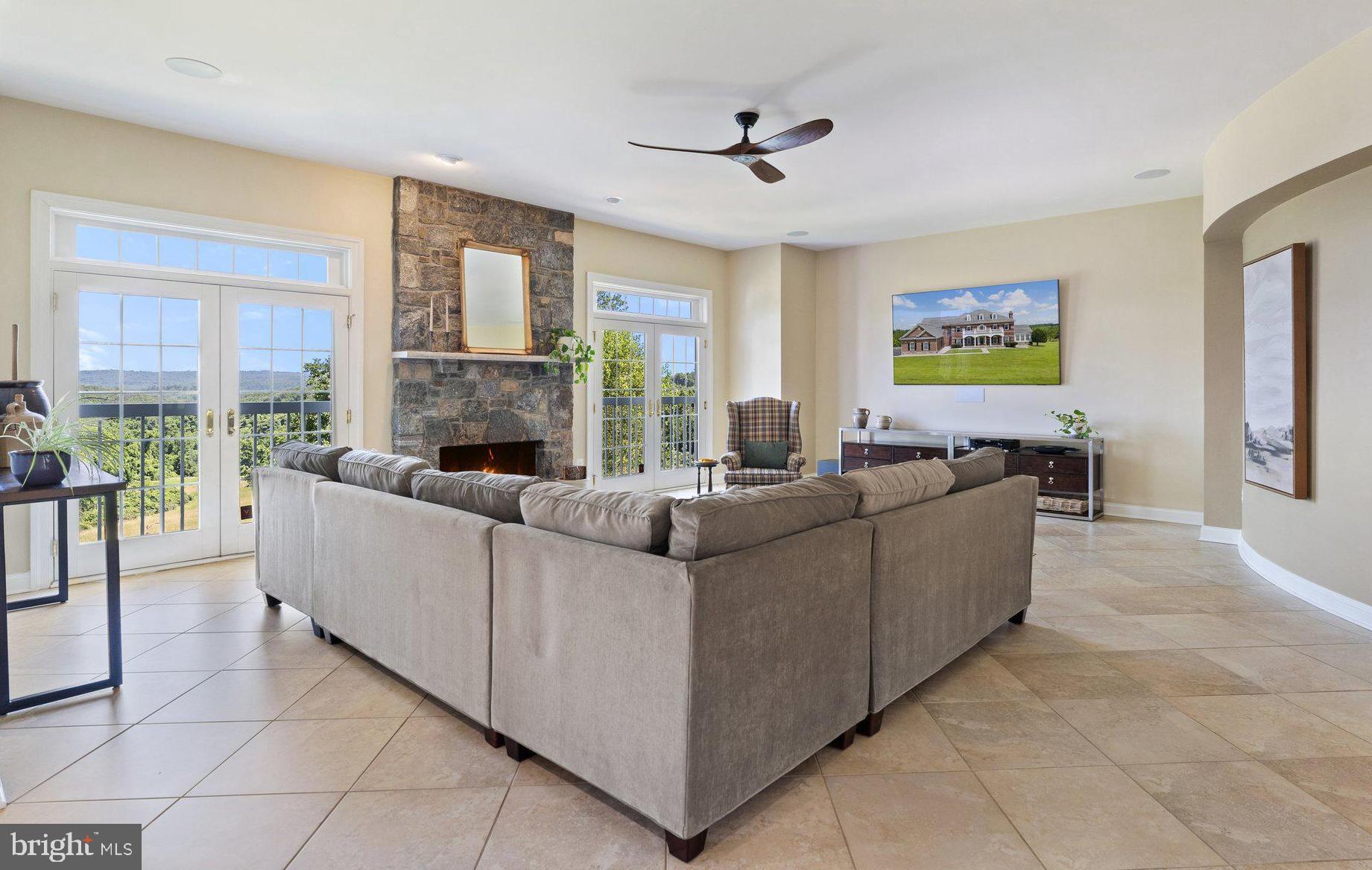 22077 Oatlands Road Aldie, VA 20105 - Photo 17 of 49 Family room with woodburning fireplace