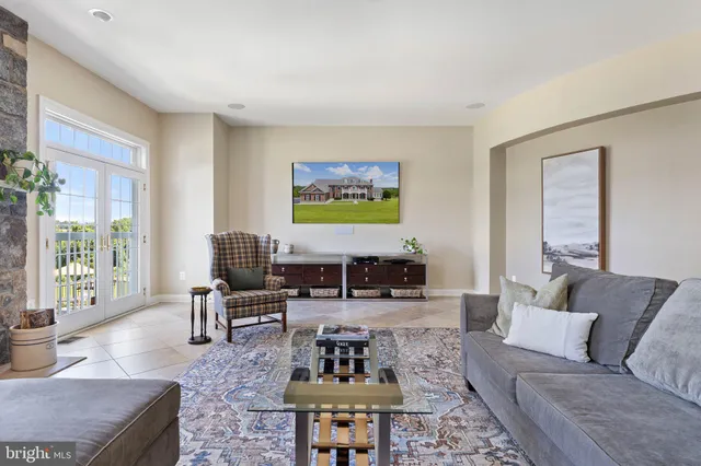 a view of a living room and dining room