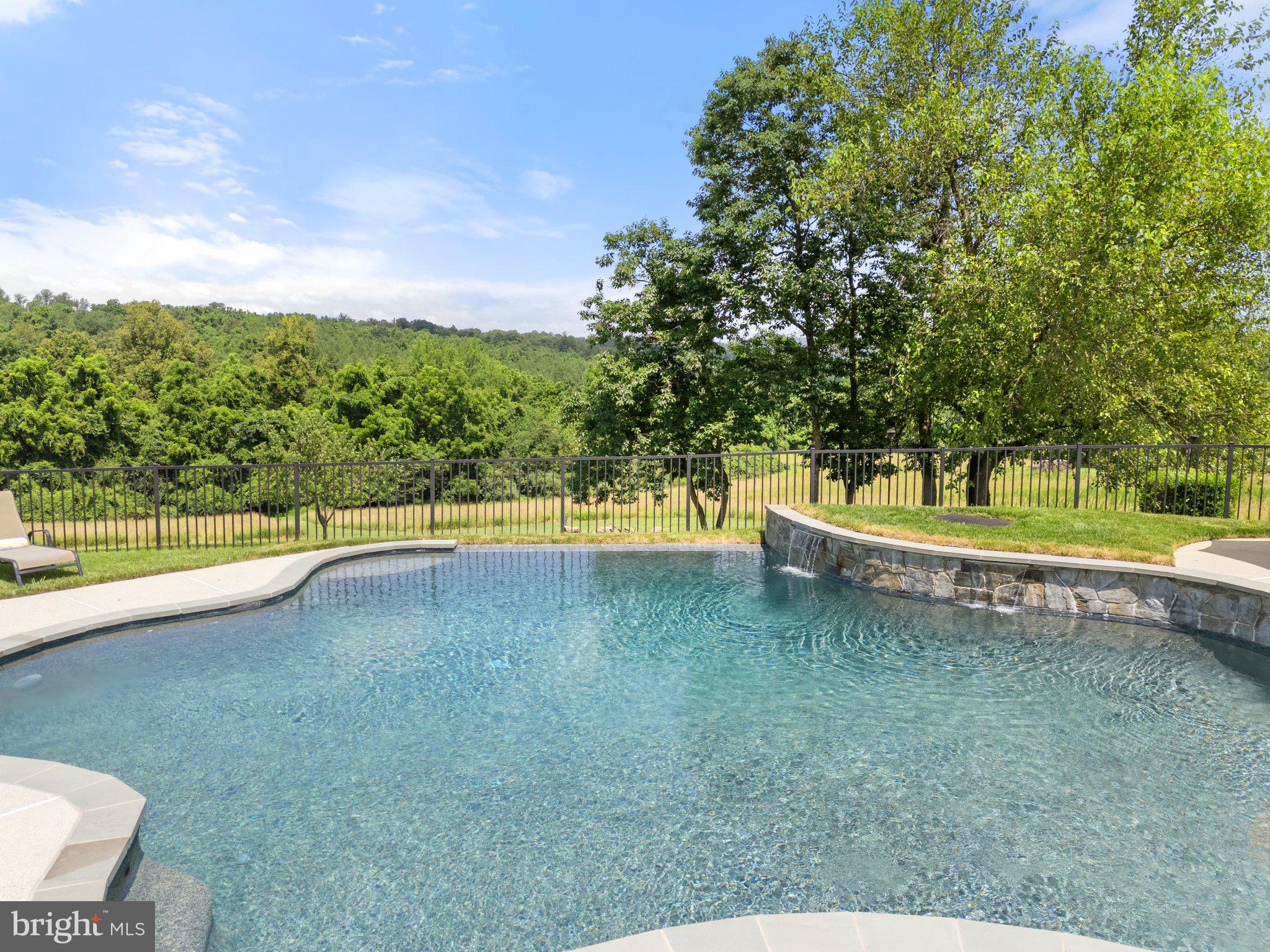 22077 Oatlands Road Aldie, VA 20105 - Photo 39 of 49 Vanishing edge pool with 3 waterfalls