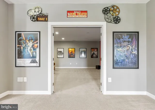 an aerial view of a house with swimming pool and garden