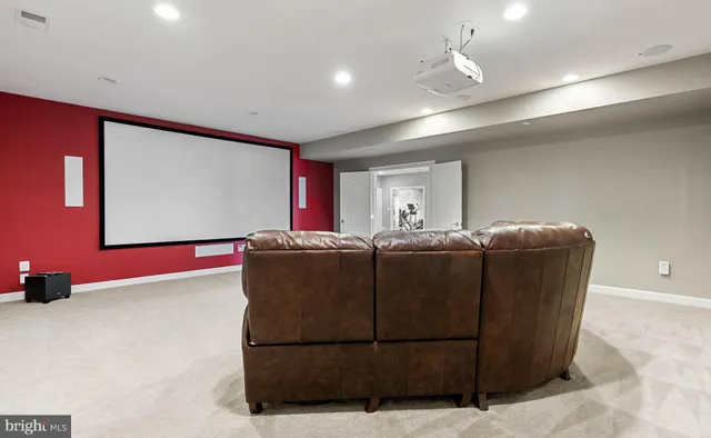 a view of a room with window and chandelier
