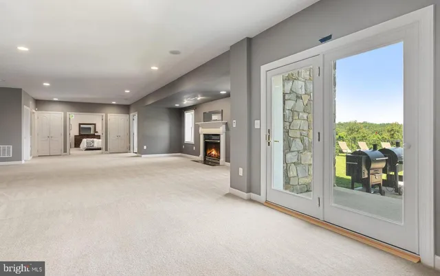 a view of a swimming pool with a yard