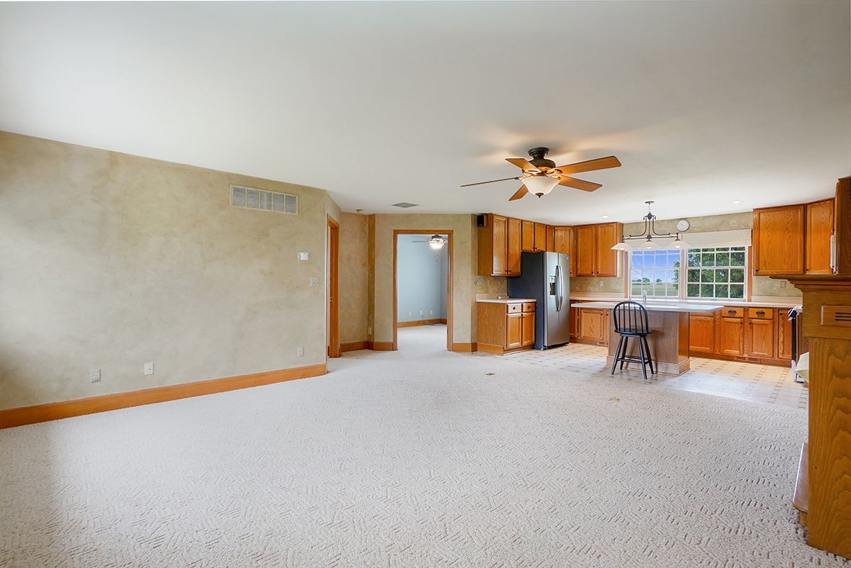 10057 Cherry Valley Road Genoa, IL 60135 - Photo 25 of 32 a view of an empty room with a window