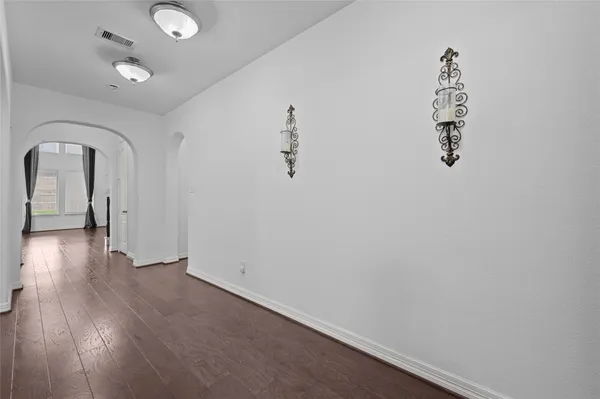 a view of a livingroom with wooden floor